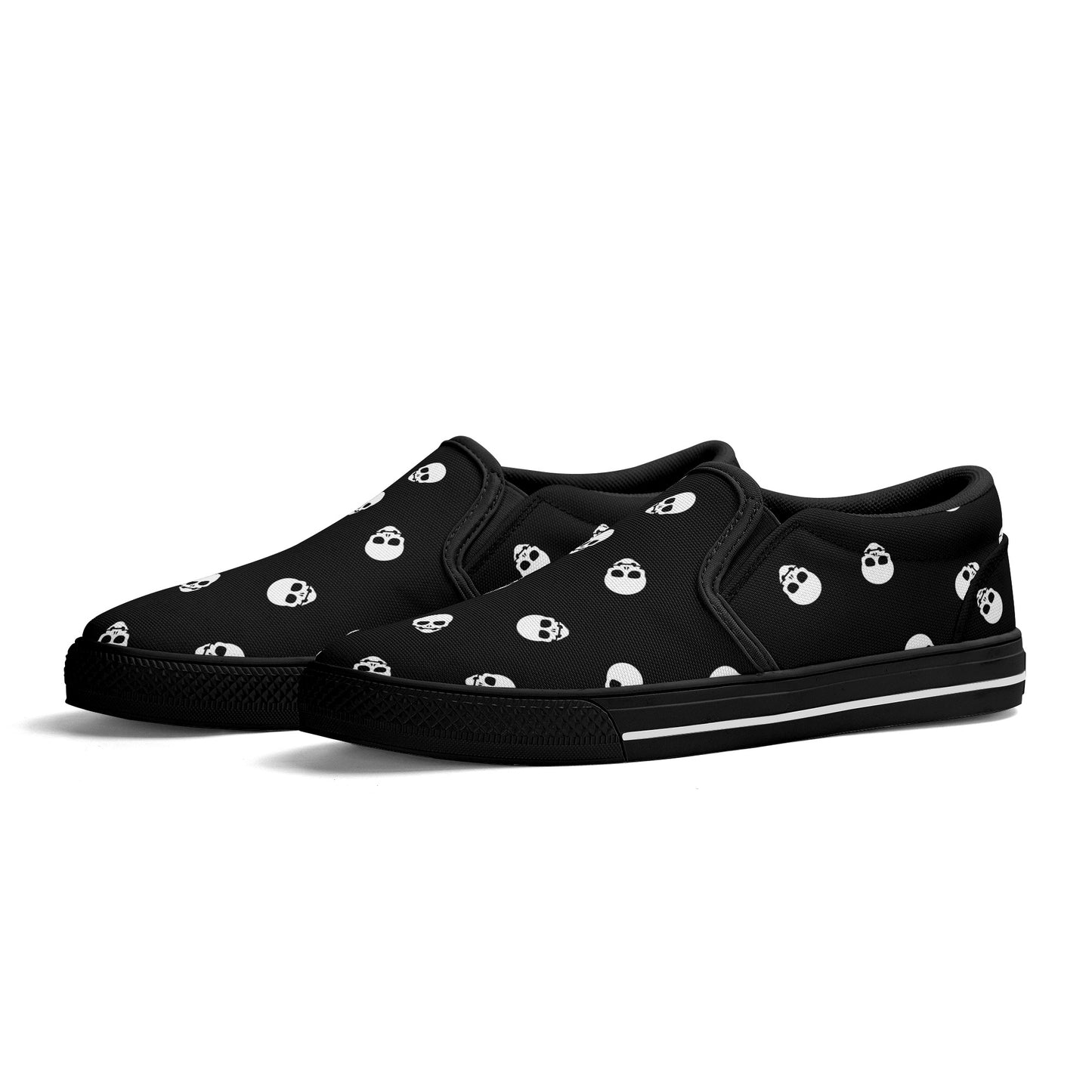 Black Canvas Slip-On Sneakers with a Killer White Skull Pattern - Warning: May cause sudden outbreaks of shoe-envy among onlookers!