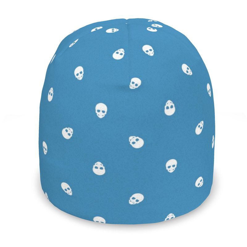 Tranquil blue beanie with an all-over white skull print, perfect for adding a bold and edgy touch to any outfit.