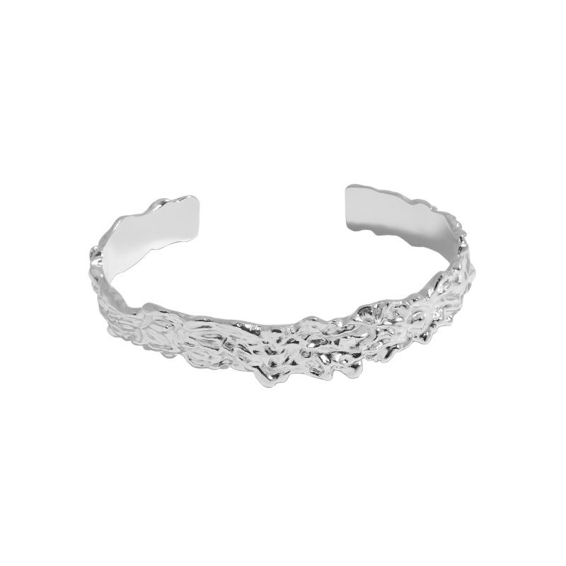 Sleek and contemporary open bangle made from 925 sterling silver with a modern irregular design, perfect for a stylish and sophisticated look.