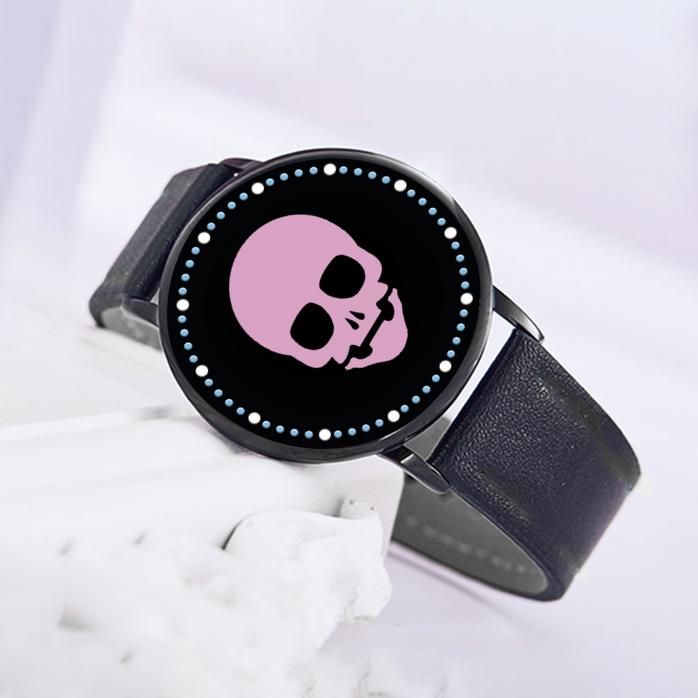 Futuristic black LED touch screen watch featuring a standout fondant pink skull face, offering a unique blend of edge and playfulness.